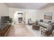 Bright living room features hardwood floors, neutral paint, modern furniture, and a smooth transition to a living space at 143 Lablanc Nw Way, Atlanta, GA 30327