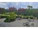 Community patio area with multiple seating areas for relaxing outdoors at 143 Lablanc Nw Way, Atlanta, GA 30327