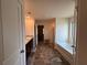 Full bathroom with double vanity, separate shower, and soaking tub at 3531 Lilly Brook Dr, Loganville, GA 30052