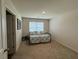 Bedroom with daybed, and bright window at 3531 Lilly Brook Dr, Loganville, GA 30052
