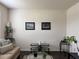 Comfortable living room featuring modern decor and ample natural light at 3531 Lilly Brook Dr, Loganville, GA 30052