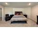 Spacious main bedroom with a large bed, bedside tables, and neutral-toned walls at 3531 Lilly Brook Dr, Loganville, GA 30052