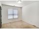 Bedroom with a window, carpet and white walls at 3550 Willow Tree Trce, Decatur, GA 30034