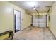 Spacious two-car garage with concrete floor, door to home, and an automatic opener at 3550 Willow Tree Trce, Decatur, GA 30034