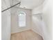 Walk-in closet with a window and carpet flooring, equipped with wire shelving at 3550 Willow Tree Trce, Decatur, GA 30034