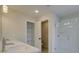 Bathroom featuring double sinks, shower, and a linen closet at 4517 Twinberry Dr, Powder Springs, GA 30127