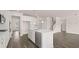 The kitchen boasts an island, modern appliances, and plenty of cabinet space at 553 Princeton Elm Place Way, Lawrenceville, GA 30045