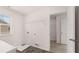 Bright laundry room with tile floors, a window for natural light, and hookups for washer and dryer at 553 Princeton Elm Place Way, Lawrenceville, GA 30045