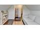Bonus room offers comfortable seating and plenty of shelves at 6468 Pierless Ave, Sugar Hill, GA 30518