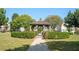 Charming wooden gazebo nestled in a manicured green space with lush hedges and a gravel path at 875 Venture Sw Way, Atlanta, GA 30331