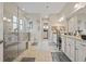 Bright bathroom boasts a double vanity, glass shower, and separate soaking tub at 170 Oakleigh Manor Dr, Fayetteville, GA 30215