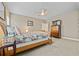Bedroom with ceiling fan and light colored carpet at 170 Oakleigh Manor Dr, Fayetteville, GA 30215