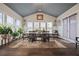 Bright dining room filled with natural light, a vaulted ceiling, and lovely decor at 170 Oakleigh Manor Dr, Fayetteville, GA 30215