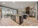 Bright kitchen features an island with stainless steel appliances, and stylish backsplash at 170 Oakleigh Manor Dr, Fayetteville, GA 30215