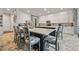 Gourmet kitchen with large center island, white cabinets, and ample counter space at 170 Oakleigh Manor Dr, Fayetteville, GA 30215
