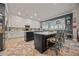 Spacious kitchen featuring two islands, white cabinets, and modern appliances at 170 Oakleigh Manor Dr, Fayetteville, GA 30215