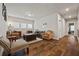 Relaxing living area featuring a comfortable seating area with natural light at 170 Oakleigh Manor Dr, Fayetteville, GA 30215