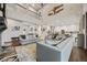 Open-concept space with living room, dining area, and kitchen with large windows at 170 Oakleigh Manor Dr, Fayetteville, GA 30215