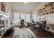 Spacious home office with dual desks, large windows, and a peaceful atmosphere at 170 Oakleigh Manor Dr, Fayetteville, GA 30215