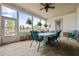 Covered patio with comfortable seating and great views of the landscaped backyard at 170 Oakleigh Manor Dr, Fayetteville, GA 30215