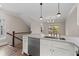 Stylish kitchen featuring a marble countertop island, stainless steel appliances, and hardwood flooring at 220 Semel Cir # 150, Atlanta, GA 30309
