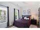Cozy bedroom with a comfortable queen-sized bed, natural light, and neutral décor, creating a relaxing space at 3272 Stillwood Dr, Atlanta, GA 30354