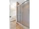 Bathroom features a sliding door shower and tiled floor at 4853 Ridgewood Creek Nw Dr, Acworth, GA 30102