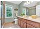 Bathroom featuring a large vanity, a walk-in shower with glass door, and a toilet at 4853 Ridgewood Creek Nw Dr, Acworth, GA 30102