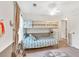 Cozy bedroom featuring bunk beds and decor with soft neutral colors and textures at 4853 Ridgewood Creek Nw Dr, Acworth, GA 30102