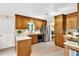 Functional kitchen equipped with stainless steel appliances and wooden cabinets at 4853 Ridgewood Creek Nw Dr, Acworth, GA 30102