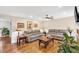 Inviting living room with hardwood floors, neutral paint, wainscoting, and comfortable seating at 4853 Ridgewood Creek Nw Dr, Acworth, GA 30102