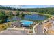 Community view of the lake and community pool. Great for relaxing and recreation at 518 Provence Gate Ln, Lawrenceville, GA 30044