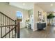 Stylish foyer with staircase, desk, and decorative accents create a welcoming atmosphere at 518 Provence Gate Ln, Lawrenceville, GA 30044