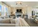 Bright and open living room featuring a modern fireplace and large windows at 518 Provence Gate Ln, Lawrenceville, GA 30044