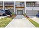 Townhome garages with rear parking and private balcony views at 2669 Caruso Way, Atlanta, GA 30339