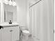 Bathroom featuring an elegant white shower curtain at 2669 Caruso Way, Atlanta, GA 30339