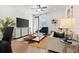 Bright living room featuring hardwood floors, cozy seating, and stylish decor for a comfortable living space at 2669 Caruso Way, Atlanta, GA 30339