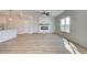 Comfortable living room with hardwood floors and a modern electric fireplace at 4534 Eastbrook Pl, Snellville, GA 30039