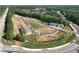This is an aerial view of newly constructed homes on spacious lots with landscaping and trees at 4659 Larkfield Way, Powder Springs, GA 30127