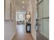 Bright and inviting foyer with wood floors and stylish decor, leading into an open-concept living space at 4659 Larkfield Way, Powder Springs, GA 30127