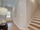 Welcoming foyer with wood floors and a staircase, leading to the upper level of the home at 4659 Larkfield Way, Powder Springs, GA 30127