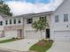 Attractive exterior view of townhomes featuring diverse siding and brickwork, enhancing the community's visual charm at 4659 Larkfield Way, Powder Springs, GA 30127