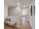 Hallway featuring a bench and doorway to an office space at 4659 Larkfield Way, Powder Springs, GA 30127