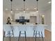 Contemporary kitchen featuring a spacious island with seating, perfect for casual dining and entertaining at 4659 Larkfield Way, Powder Springs, GA 30127