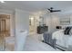 A main bedroom features a ceiling fan, carpet, and neutral colored walls at 4659 Larkfield Way, Powder Springs, GA 30127