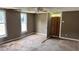 Bedroom featuring hardwood floors, natural light and a ceiling fan at 700 W College St, Bowdon, GA 30108