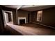 Living Room of the house with fireplace and hardwood floors at 700 W College St, Bowdon, GA 30108