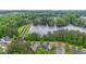 Lush trees surrounding a beautiful lake near a residential community at 7979 Larksview Dr, Fairburn, GA 30213
