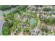 Aerial shot of community amenities including a playground, park, and basketball court alongside residential homes at 7979 Larksview Dr, Fairburn, GA 30213