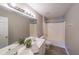 Bathroom with double vanity, large mirror, shower, tub and neutral color palette at 7979 Larksview Dr, Fairburn, GA 30213
